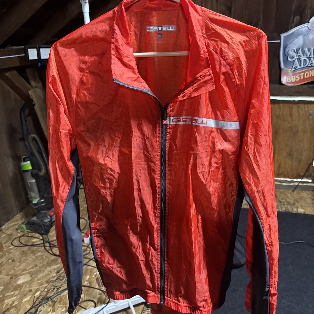 Castelli orange cycling jacket mens XL. Very Light. Amazing condition.